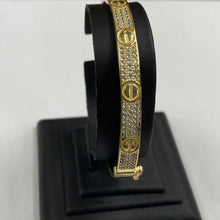 Load image into Gallery viewer, REVERSIBLE 10k Gold Designer Inspired Bangle with Two Wearable Designs
